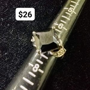 Silver tone statement ring with hematite stone